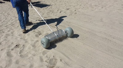 Sand cleaning tool, beach cleaning tool, beach cleaning equipment, beach cleaners, Volleyball Sand,  Volleyball Court Cleaner, Volleyball sand device, sand cleaning manual tool